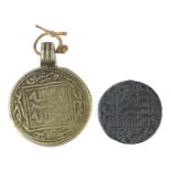 13th century Arabian coin and one other, the largest 4cm high :For Further Condition Reports