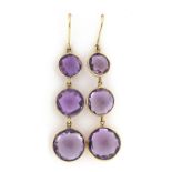 Pair of 9ct gold graduated amethyst drop earrings, 6cm high, 8.9g :For Further Condition Reports