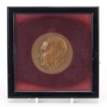 Robert Soupault commemorative bronze medallion housed in a glazed frame, dated 1968 and Antony