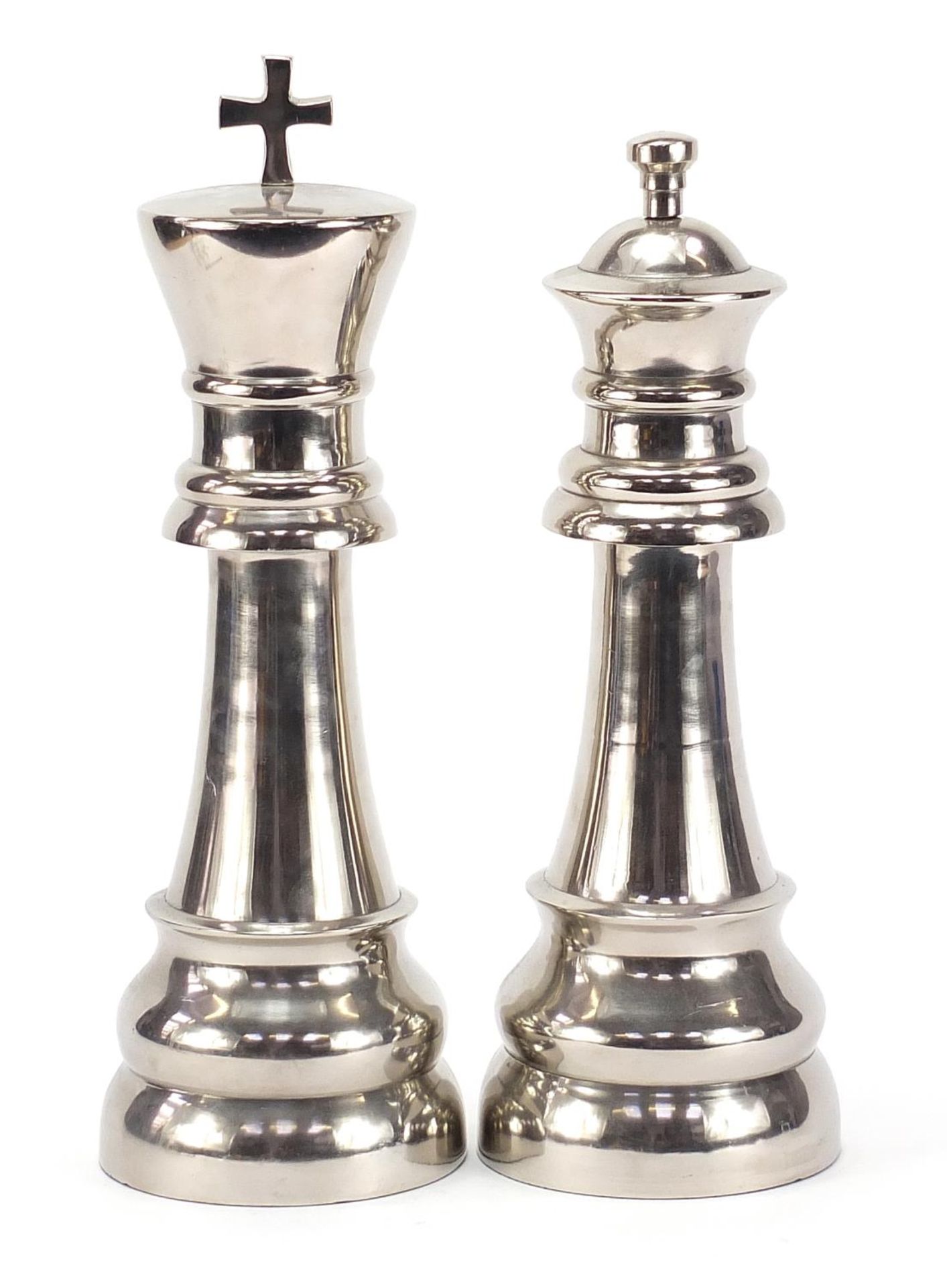 Pair of large silvered king and queen chess pieces, the largest 34cm high :For Further Condition