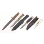 Four military interest knives including German and trench examples, the largest 28.5cm in length :
