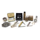 Objects including a Ronson lighter with box, heavy dragon belt buckle, military interest