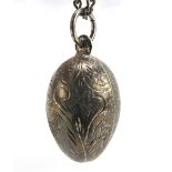 Silver engraved egg pendant on a sterling silver necklace, 4cm high and 56cm in length, total 19.