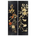 Two Chinese lacquered wall plaques with mother of pearl and stone inlay depicting birds of paradise,