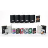 Eight Zippo pocket lighters with boxes comprising Battle of Britain, D-Day, Jack Daniels, Harley