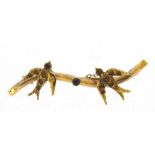 Antique 9ct gold bird bar brooch set with a purple stone, 4.5cm wide, 2.1g :For Further Condition