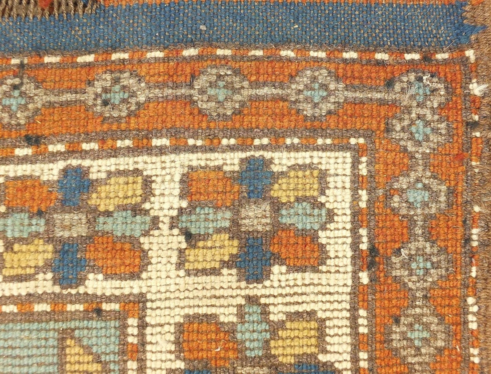 Rectangular Persian rug having a floral border onto orange grounds, 303cm x 131cm :For Further - Bild 4 aus 4