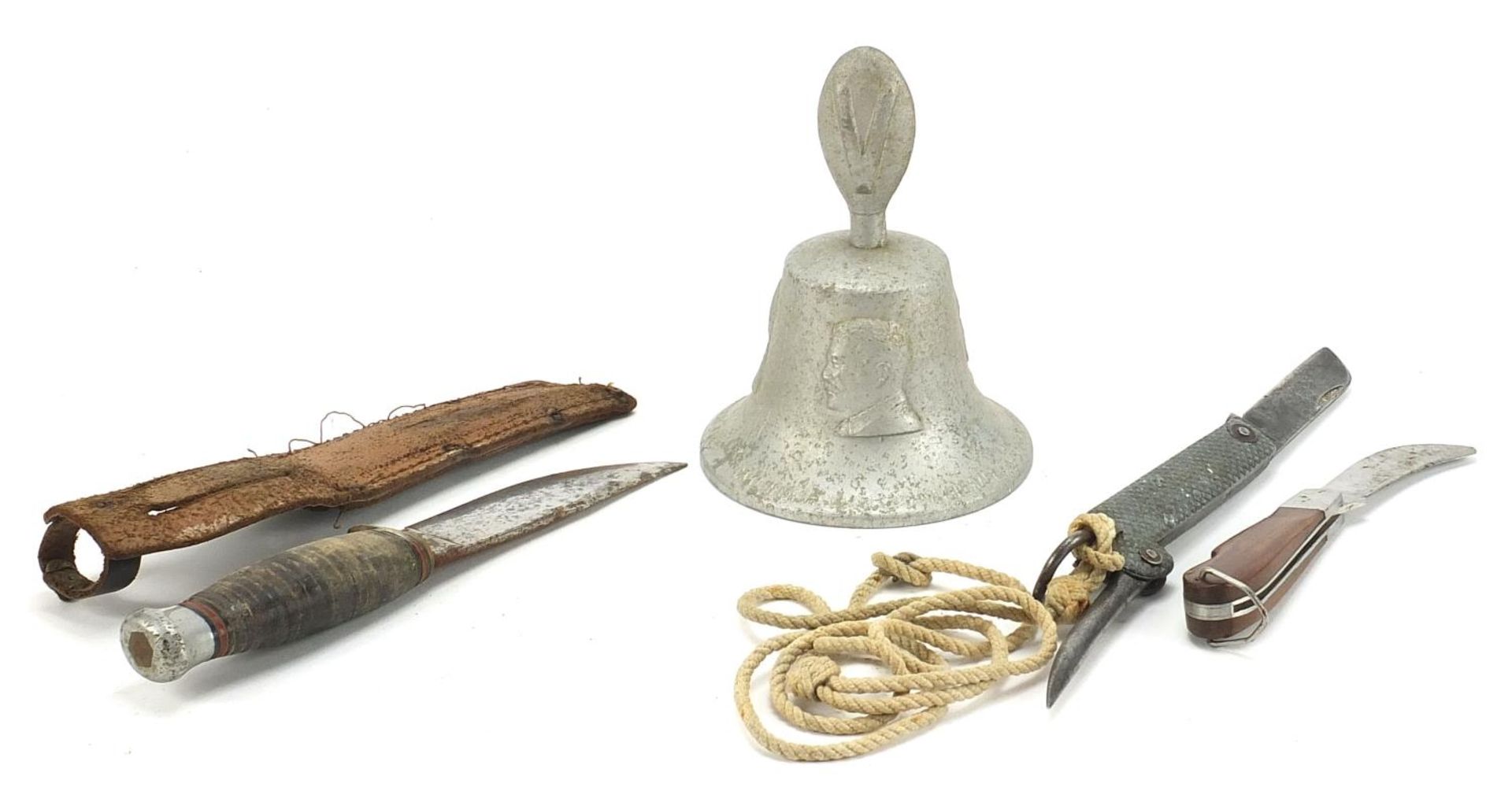 Militaria comprising a bell made from a German aircraft, folding pocket knife and a combat knife, - Image 4 of 5