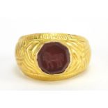 Antique unmarked gold intaglio seal ring carved with a horse, (tests as 15ct+) size U, 5.6g : For