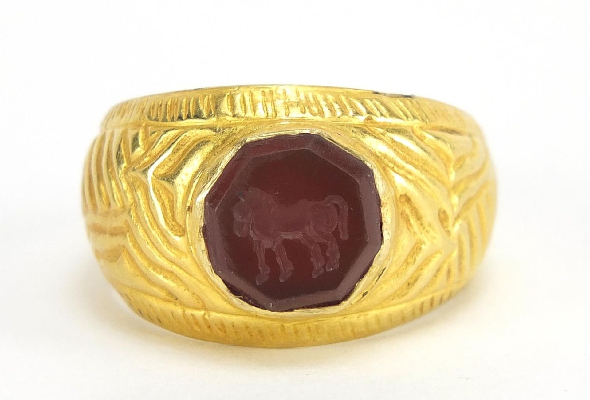 Antique unmarked gold intaglio seal ring carved with a horse, (tests as 15ct+) size U, 5.6g : For