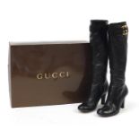 Pair of Gucci black leather boots with box, size 35 1/2 : For Further Condition Reports Please Visit