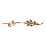 Two 9ct gold bar brooches set with ruby, seed pearls, garnets and opals, the larges 4.5cm wide,