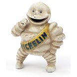 Cast iron Michelin man figure, 15.5cm high : For Further Condition Reports Please Visit Our