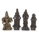 Four Indian patinated bronze votive figures, the largest 10cm high : For Further Condition Reports