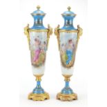 Large pair of French porcelain vases and covers with gilt bronze mounts in the style of Sevres, each