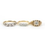 Three 18ct gold and 9ct gold clear stone rings, sizes F, L and O, 6.0g : For Further Condition