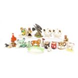 Collectable china including two Wade money banks, Silvac design dogs and Goebel monk jugs, the