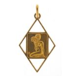 18ct gold pendant depicting a nude female with flowers, 4cm high, 3.3g : For Further Condition