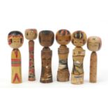 Six large Japanese Kokeshi dolls, the largest 24.5cm high : For Further Condition Reports Please