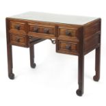 Good Chinese burr wood five drawer writing desk with carved dog of Foo head handles, 83cm H x