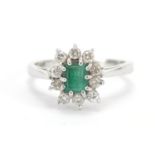 18ct white gold emerald and diamond ring, each diamond approximately 2.0mm in diameter, size K, 3.0g