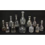 Twelve Georgian and later glass decanters including one with three rings, nail & head pattern and