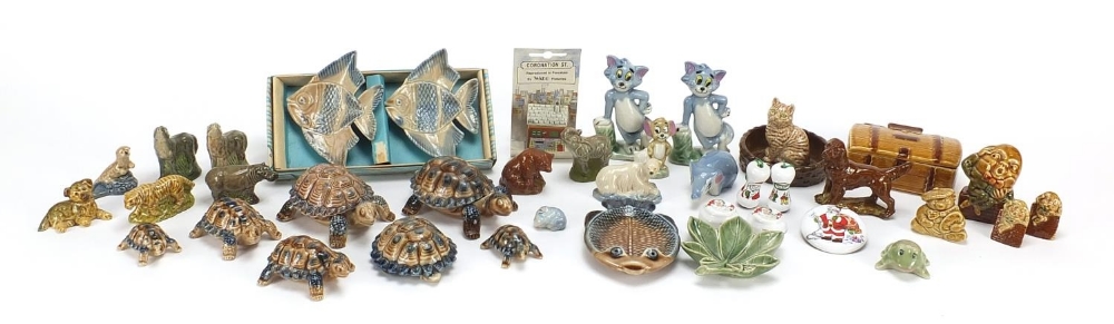 Collection of Wade Whimsies, tortoises, Tom & Jerry figures and fish dishes, the largest 9cm