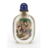 Chinese glass snuff bottle with hardstone stopper, internally hand painted with females, 10.5cm high