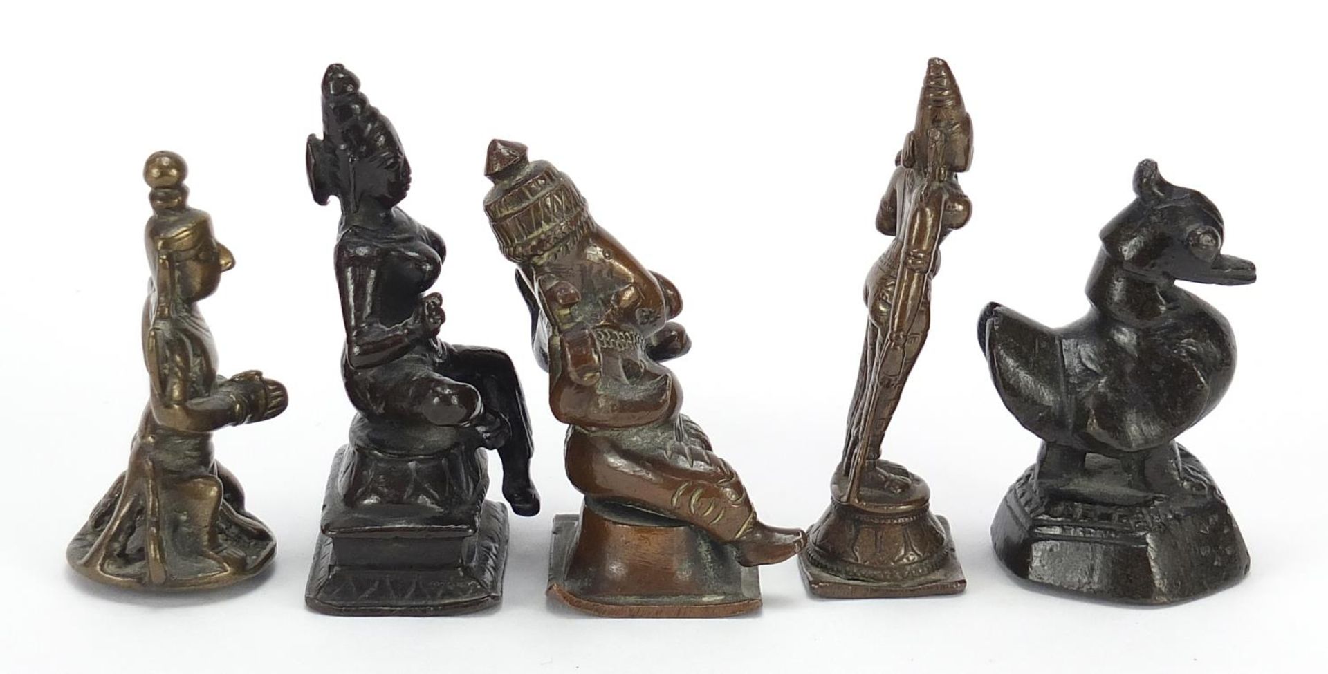 Four Indian patinated bronze votive figures and a bird weight, the largest 6.5cm high : For - Bild 6 aus 8
