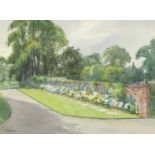 R H Yates - Garden border before a stately home, signed watercolour, mounted, framed and glazed,