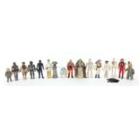 Sixteen vintage Star Wars action figures with accessories including Luke Skywalker, Boba Fett,