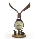 Patinated bronze eagle design globular desk clock, 21.5cm high : For Further Condition Reports
