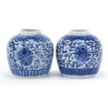 Near pair of Chinese blue and white porcelain ginger jars hand painted with flowers, four figure