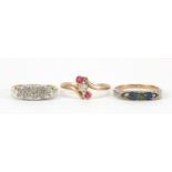 Three 18ct and 9ct gold rings set with colourful stones including pink and white sapphire, sizes