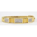 18ct gold diamond cluster hinged bangle, set with forty two diamonds the diamonds approximately 2.