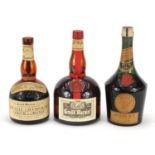 Three vintage bottles of liqueur comprising Grand Marnier Old Fine Champagne Cognac and Orange,