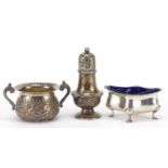 Silver objects comprising twin handled salt, baluster shaped caster and open salt with blue glass