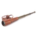 Military interest three draw brass telescope with leather case, 29.5cm in length when closed : For