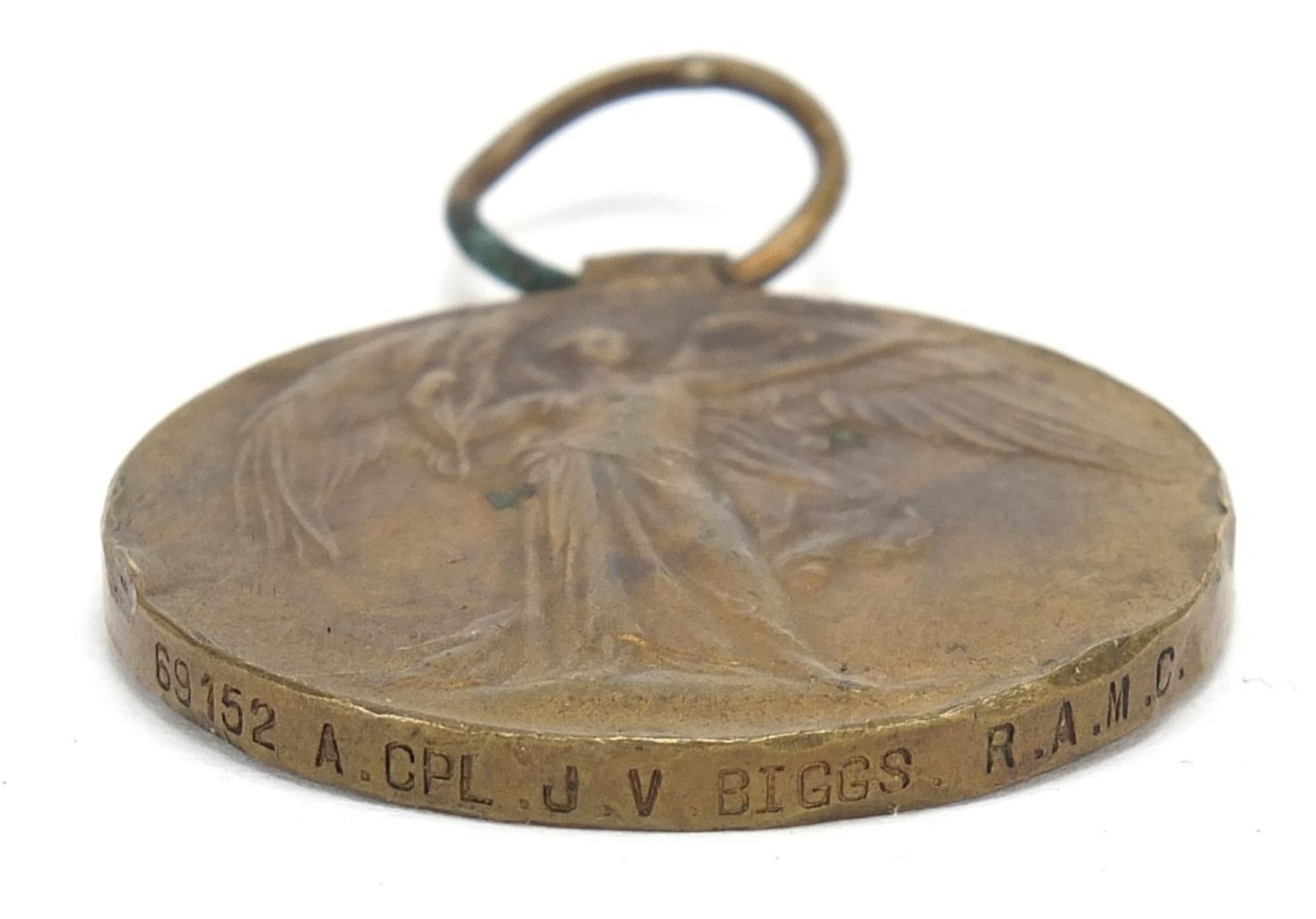 British militaria including four World War II medals, Intelligence Corps cap badge, Elizabeth II - Image 7 of 9