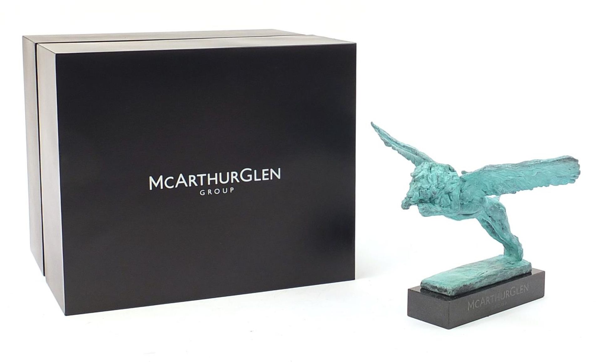 Mark Coreth for McArthur Glen Group, Verdigris bronze study of a winged lion raised on a rectangular