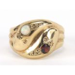 9ct gold serpent ring set with a garnet and opal, size Q, 4.2g : For Further Condition Reports