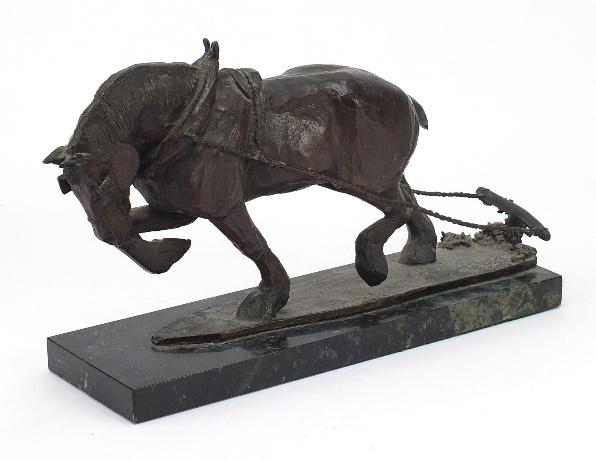 Patinated bronze workhorse raised on a rectangular green marble base, 32cm in length : For Further