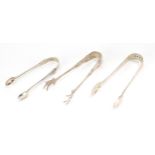 Three pairs of Victorian and later silver sugar tongs including a pair of chicken claw design,