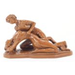 Resin sculpture of two lovers, 32cm wide : For Further Condition Reports Please Visit Our