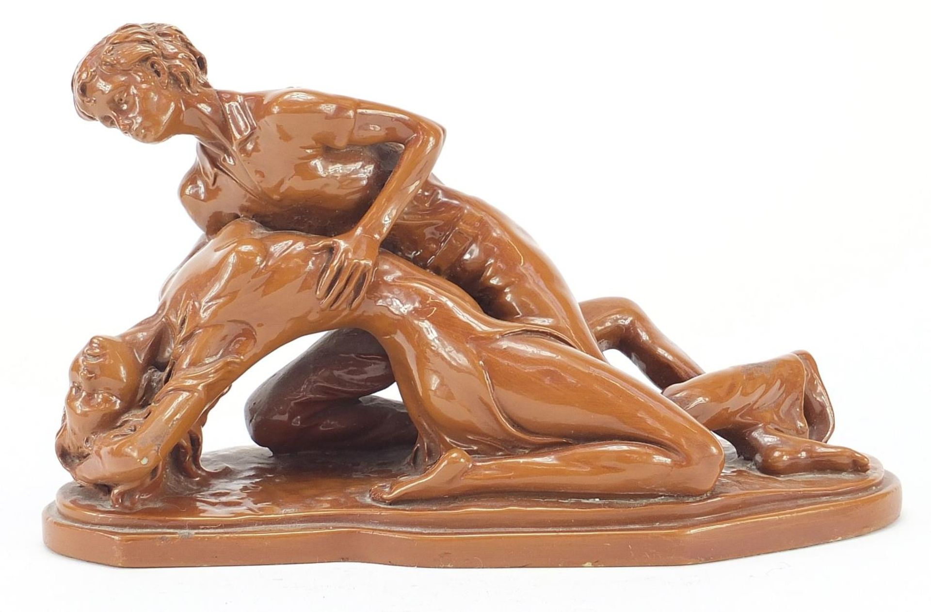 Resin sculpture of two lovers, 32cm wide : For Further Condition Reports Please Visit Our