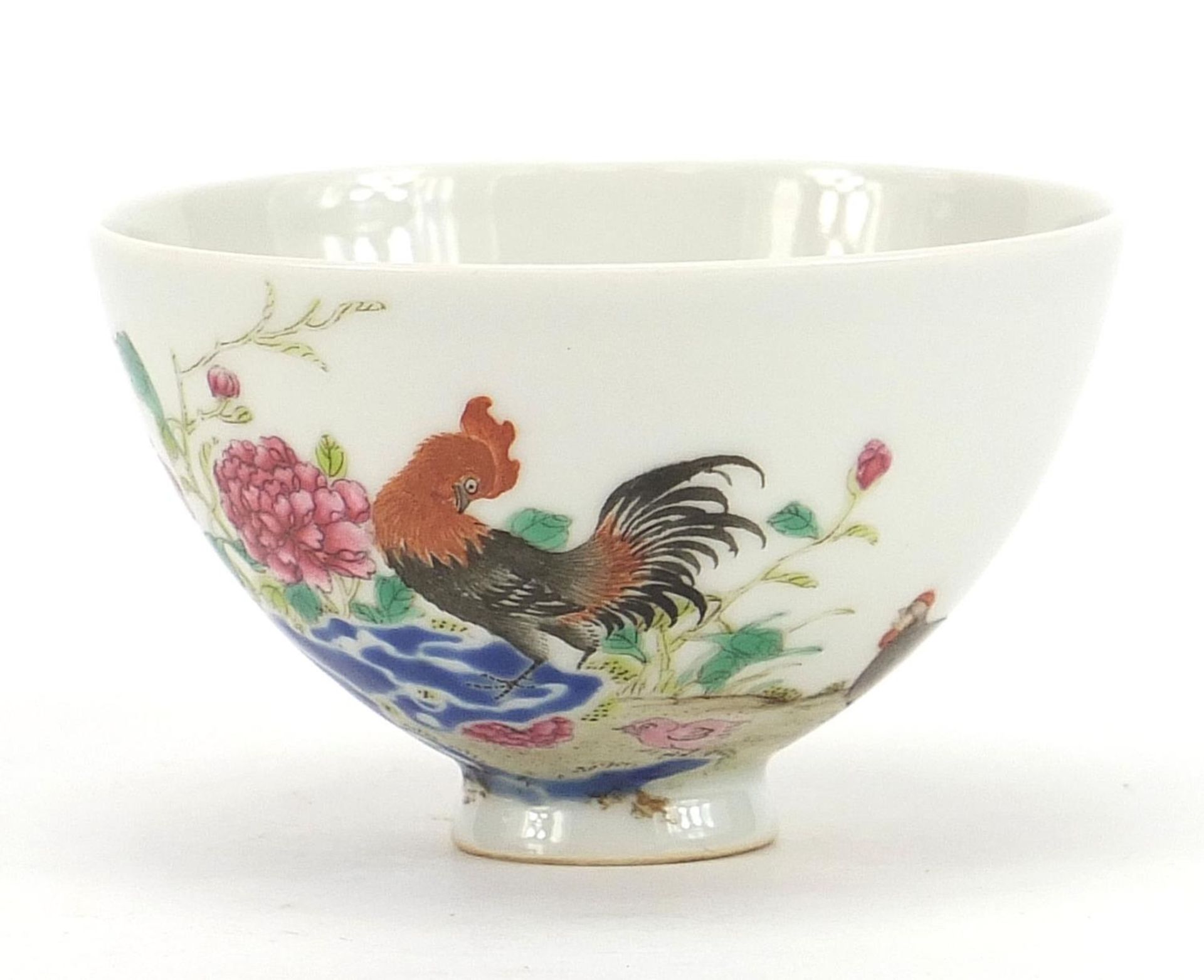 Chinese porcelain bowl finely hand painted in the famille rose palette with chickens amongst