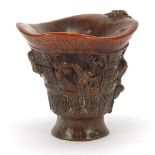 Chinese libation cup carved with dragons, four figure character marks to the base, 12.5cm high : For