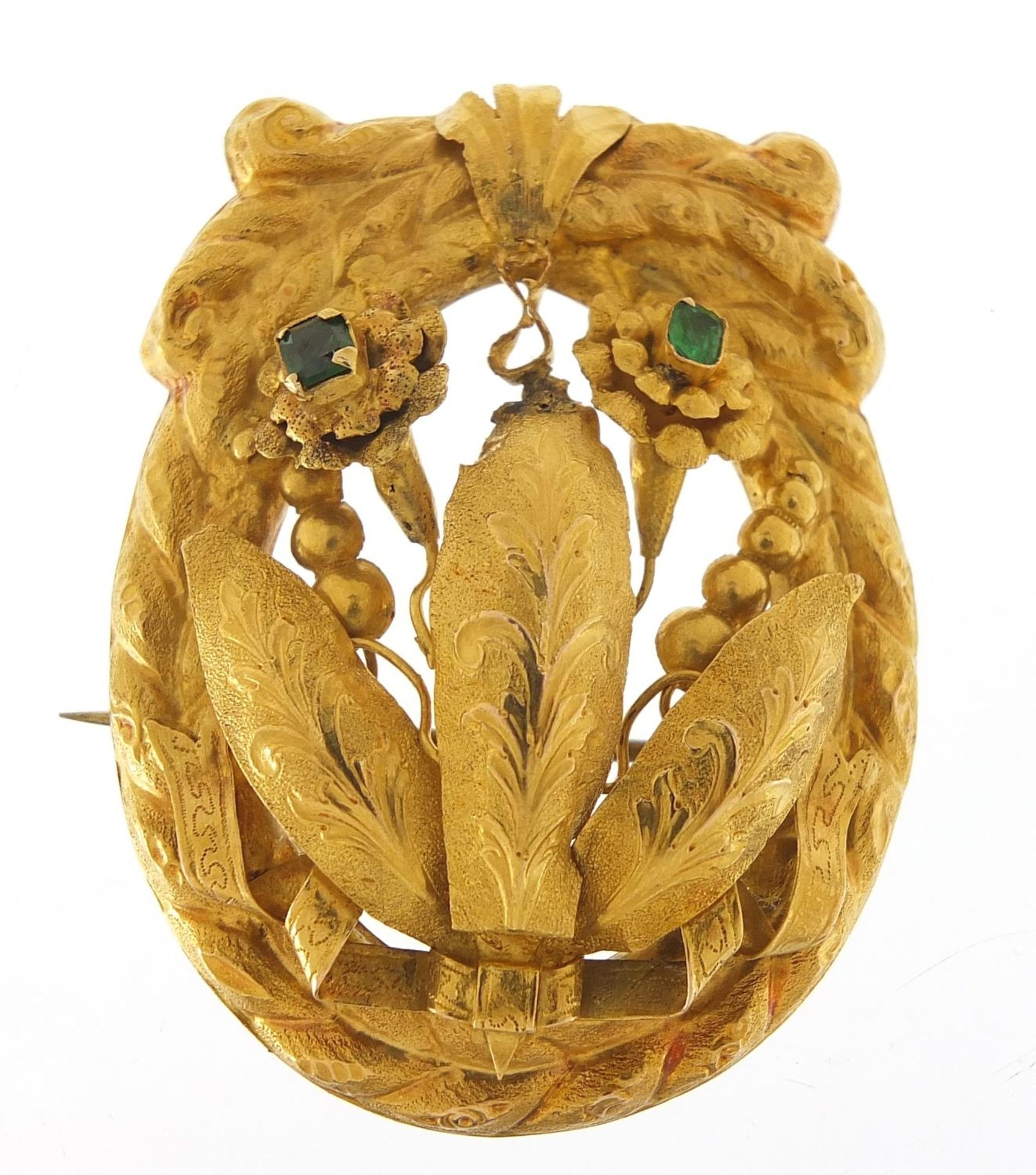 Large unmarked gold naturalistic brooch (tests as 9ct gold) set with green stones, possibly