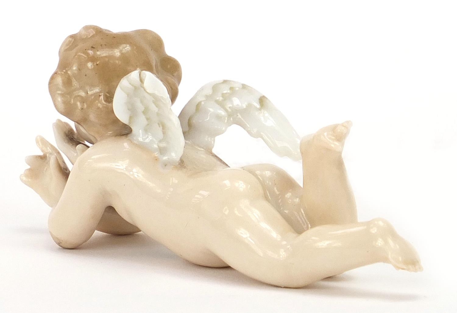 19th century Meissen style porcelain figure of Putti, 8.5cm in length : For Further Condition - Image 2 of 4