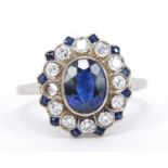 18ct white gold blue stone and diamond cluster ring, size Q, 2.6g : For Further Condition Reports